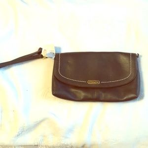 brown Coach wristlet